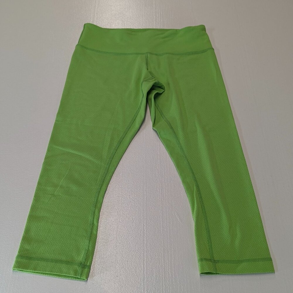 Lululemon Size 6 Lime Green Capri Leggings *Small Stain